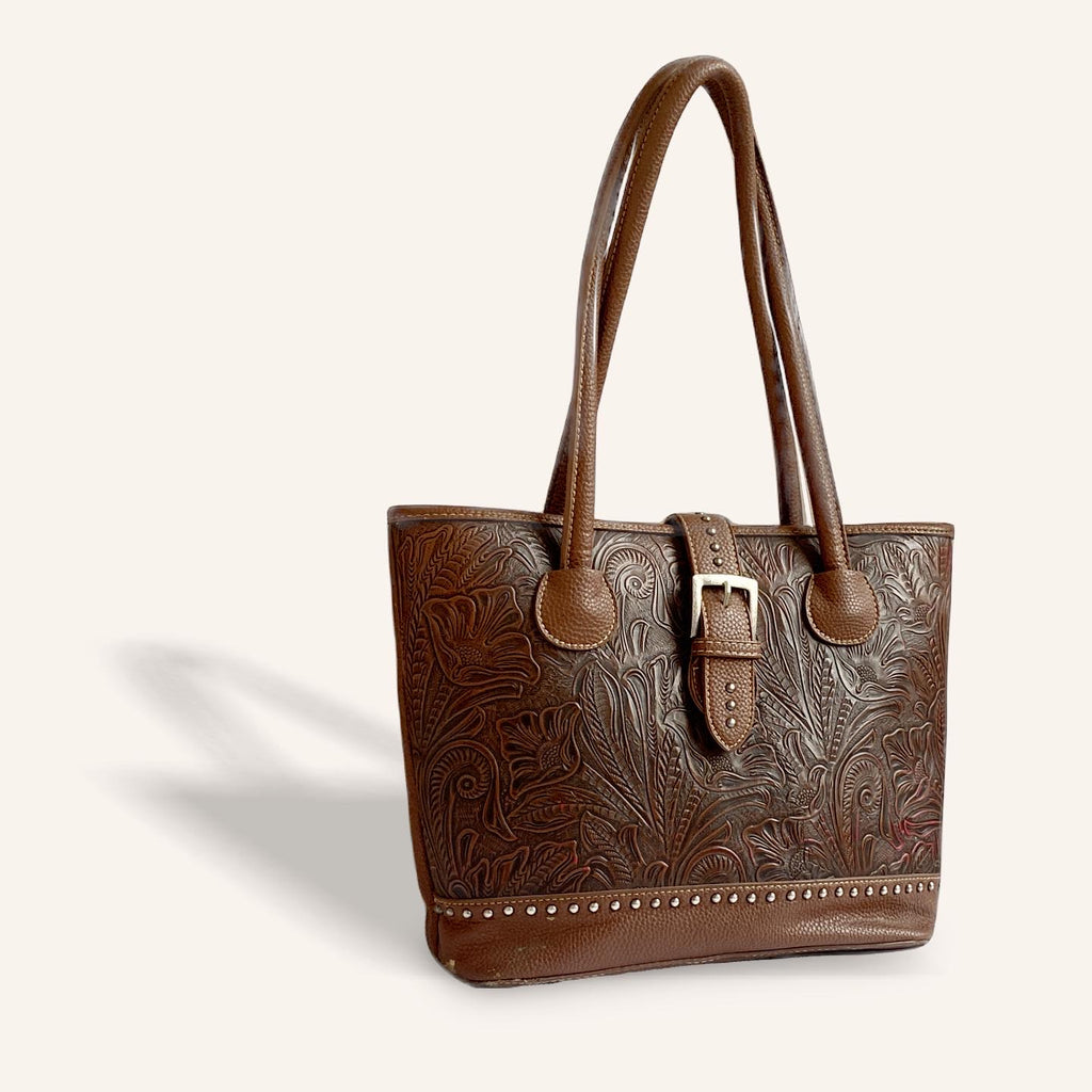 Leather tote bag with tooled details